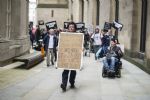 Disabled People Against Cuts wall of noise protest Manchester Conservative Party Conference